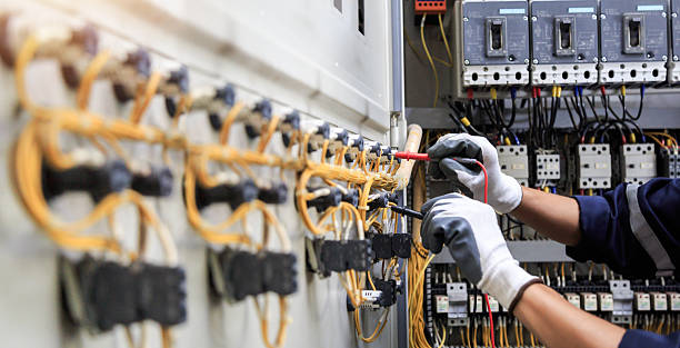Professional Electrician technician working in Chesnut Hill, PA